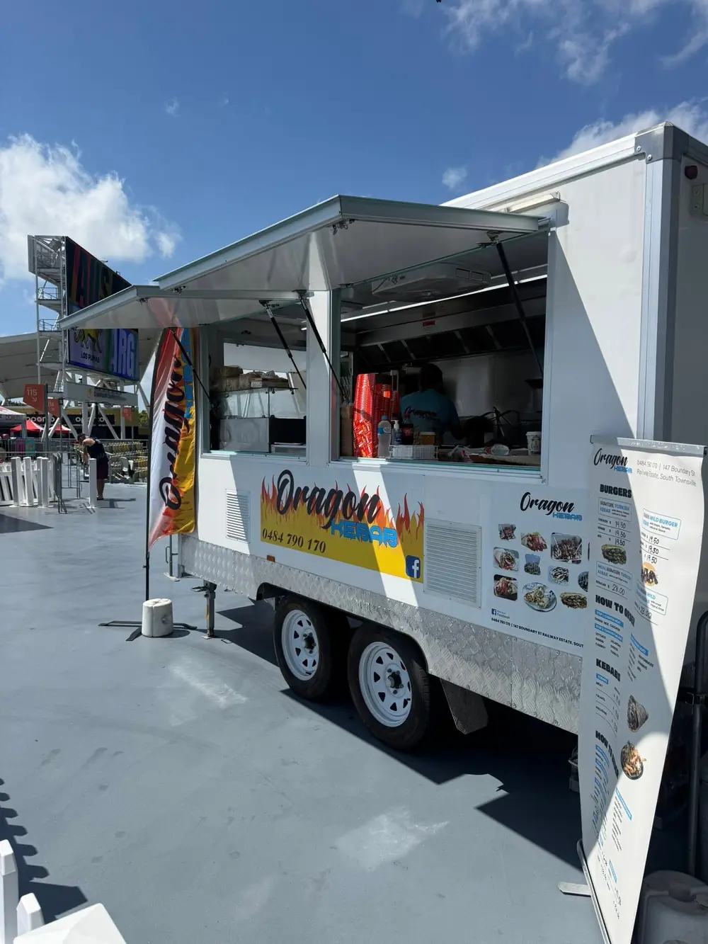 Oragon Kebab food truck parked at an outdoor event space